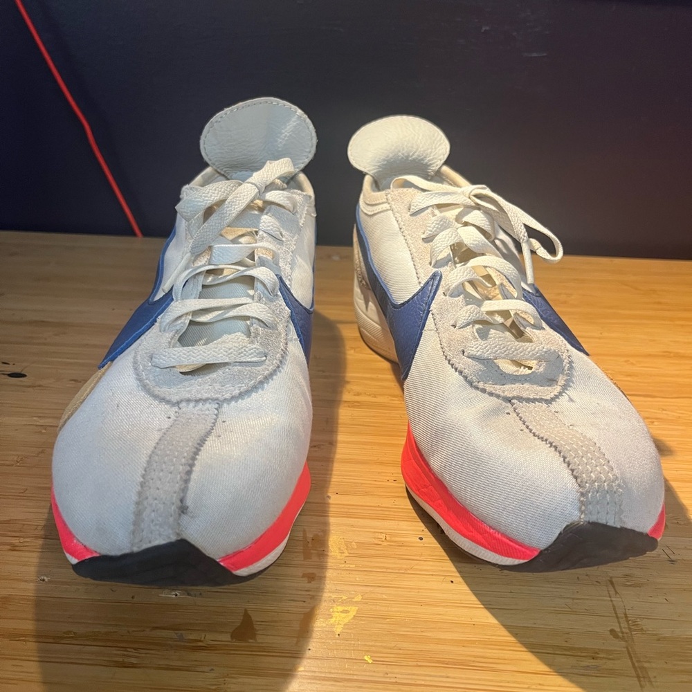 Nike Blue and White Sneakers with Red Highlights great condition